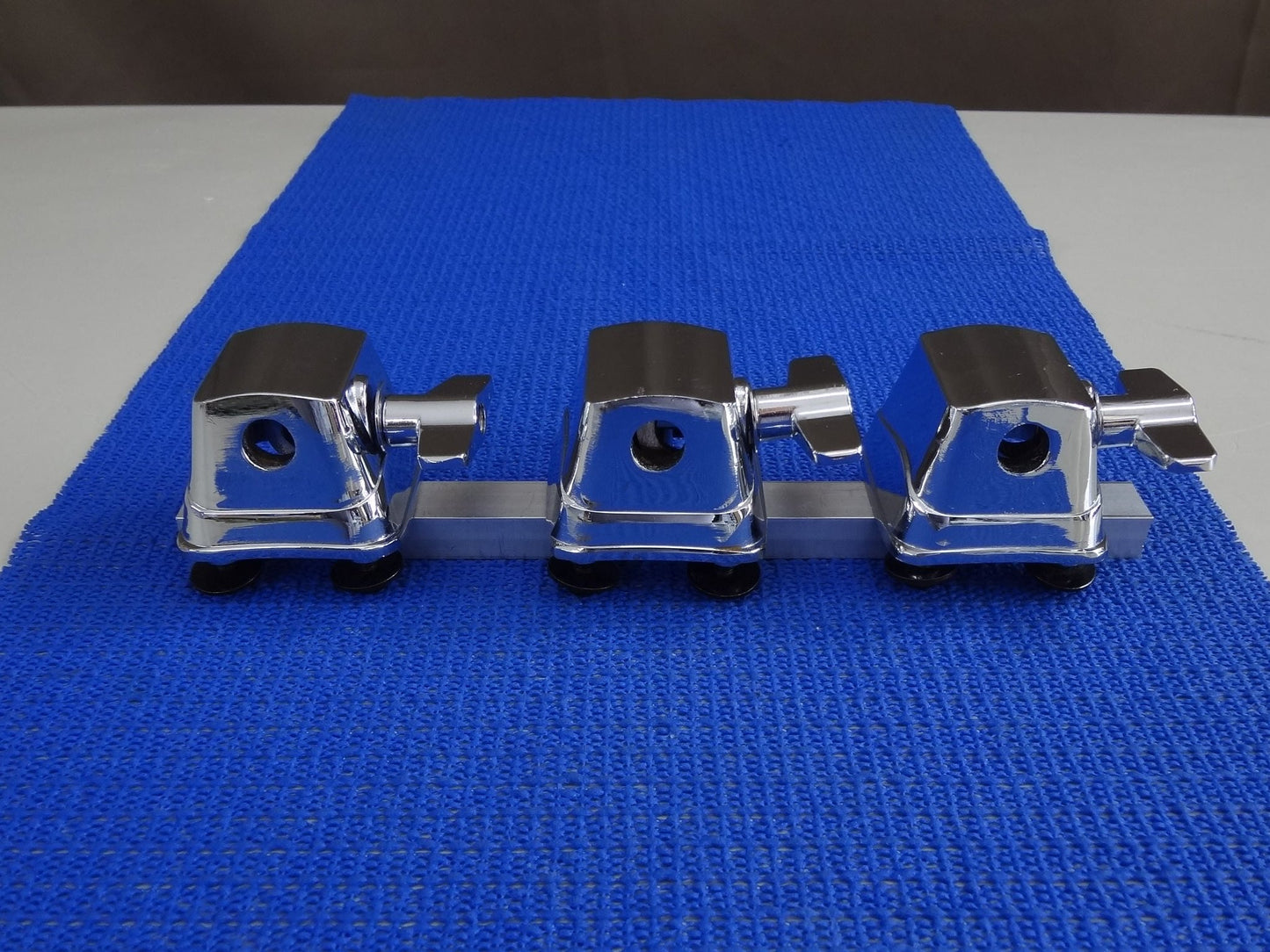 NEW SET CHROME FLOOR TOM LEG MOUNTS.