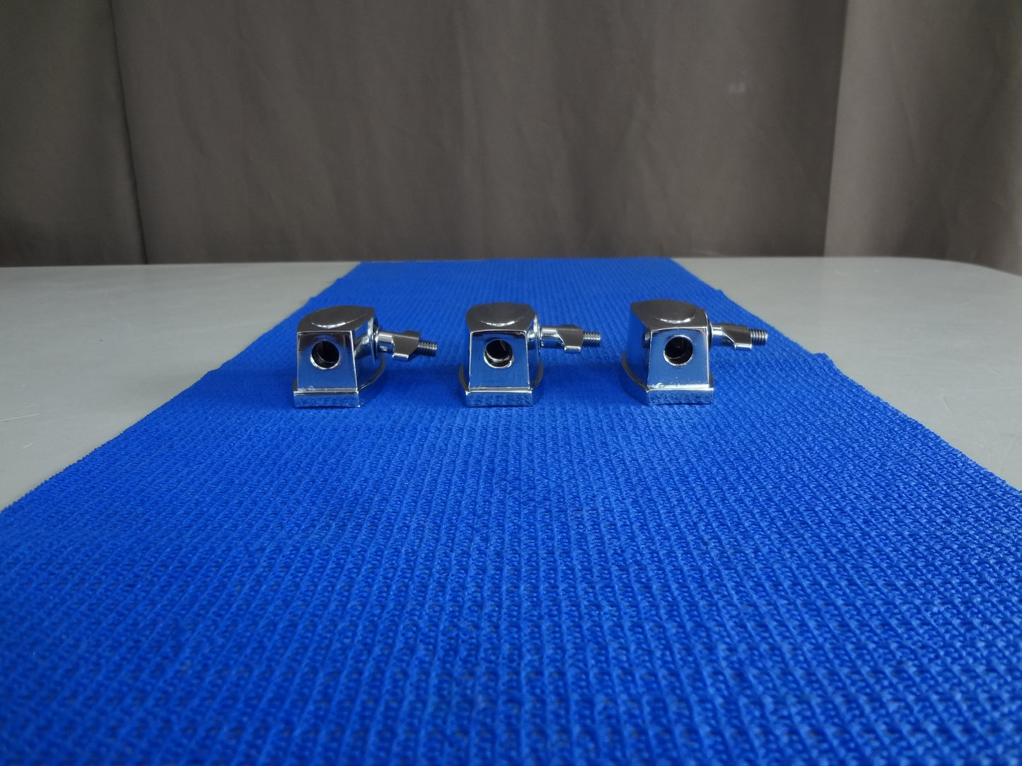 NEW SET OF FLOOR TOM LEG MOUNTS.