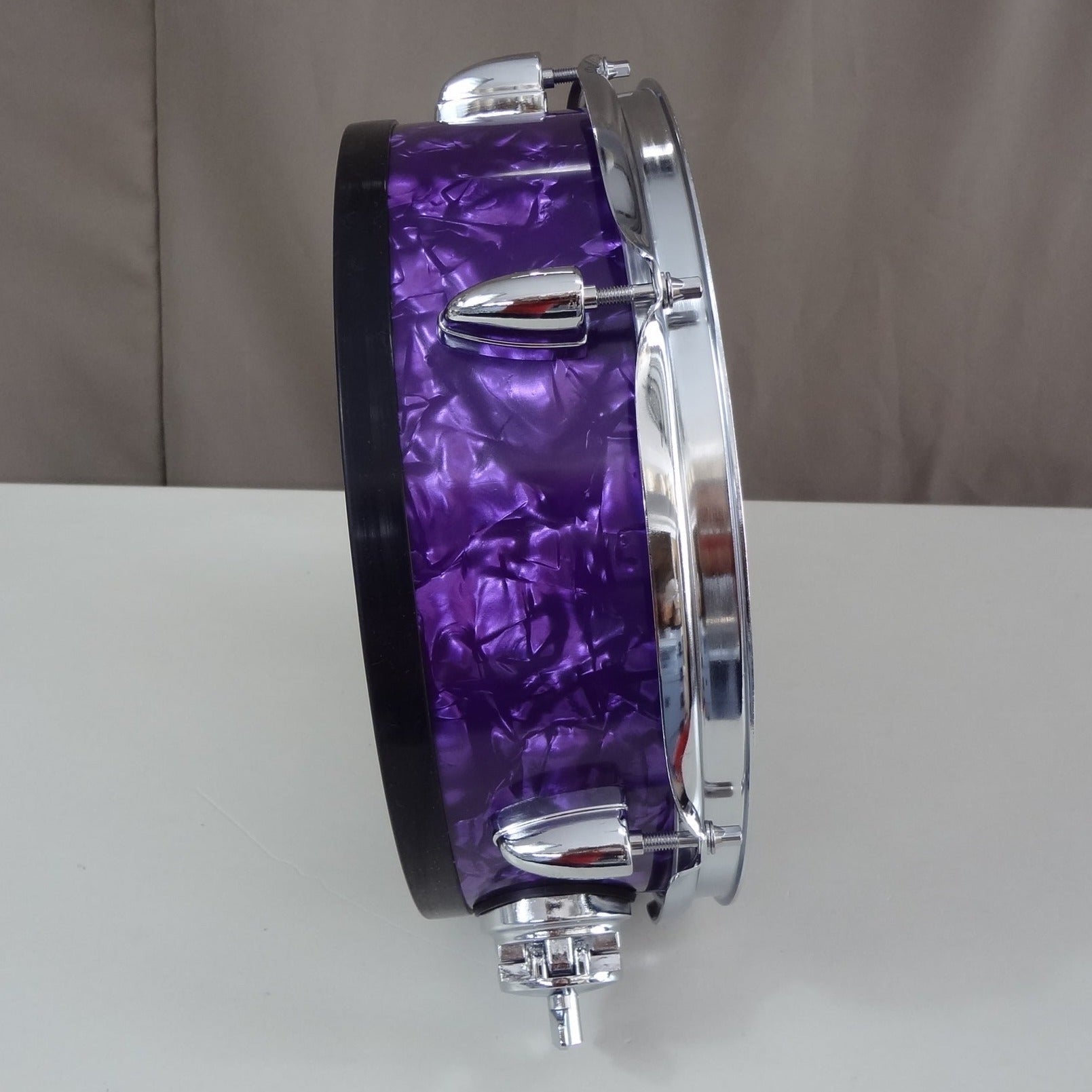 Side view of 12 inch custom electronic snare drum purple pearl wrap