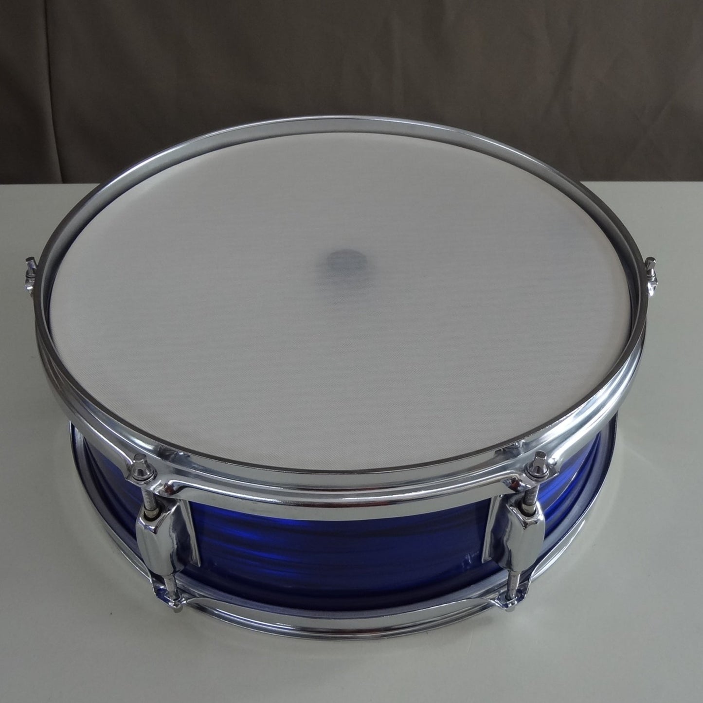 Top down image of new 13 inch custom electronic snare drum blue oyster