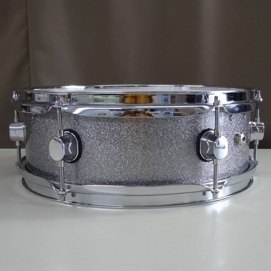 Profile view of new 13 inch custom electronic snare drum silver sparkle wrap
